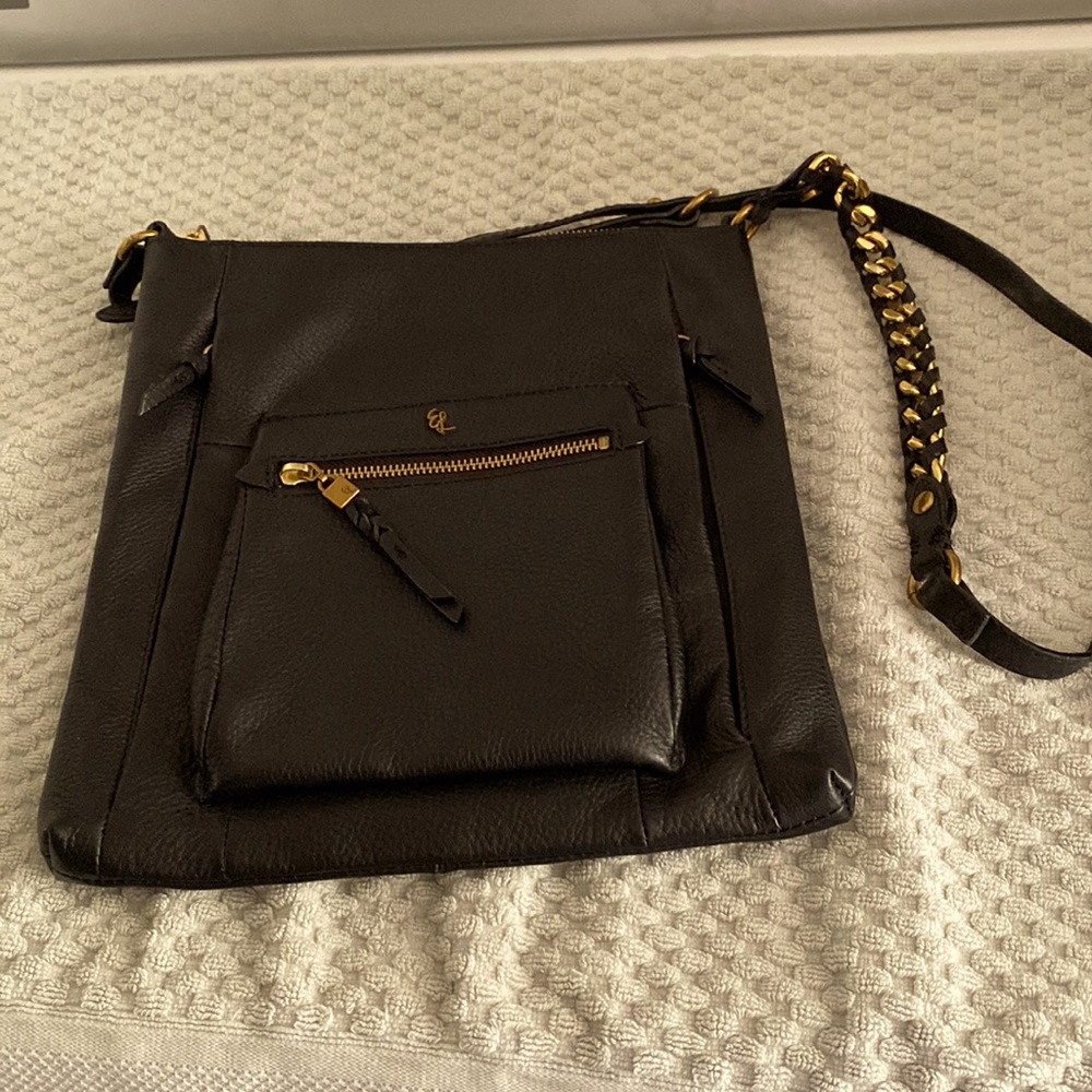 Adjustable handle short or cross body.